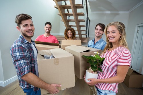 Professional flat removals team planning a move in Stjohnswood