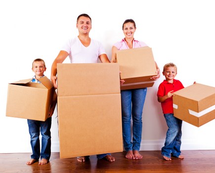Packed moving boxes and furniture for a local flat removal in St Johns Wood