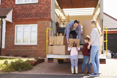 Students moving boxes during a removal service in Stjohnswood