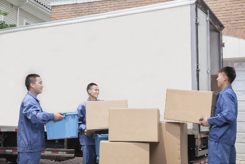 Professional house removalists in Stjohnswood loading furniture carefully