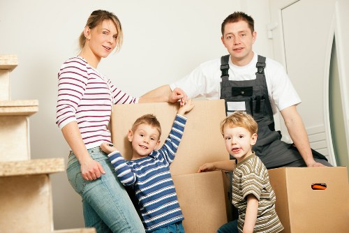 Team member loading furniture safely into a van